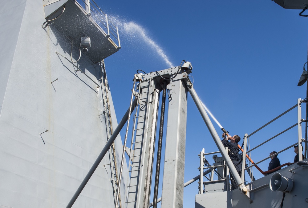 USS Dewey Sailors Perform Fresh Water Wash Down of Ship