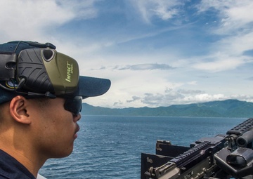 The amphibious dock landing ship USS Green Bay (LPD 20) transits the San Bernardino Strait