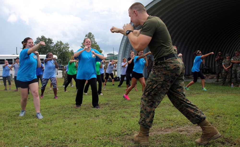 A day in their boots: MAG-29 spouses crawl, march, and run like a Marine for a day