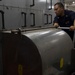 USS Zumwalt Sailor performs maintenance