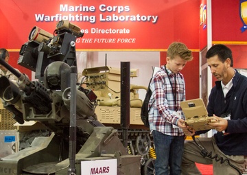 Boy's Battle Bots Intrigue Marines