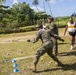 Koa Moana plays in Tahitian games