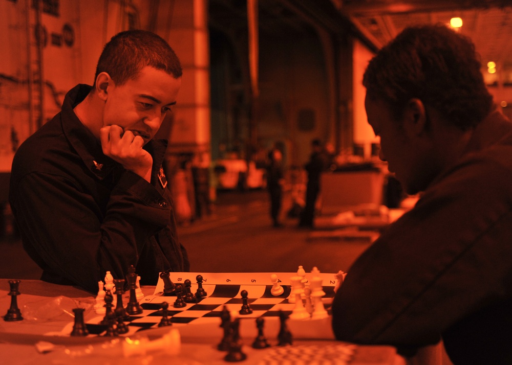 Nimitz Sailors play chess