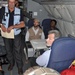 The president of Haiti and U.S. Ambassador to Haiti recieve a safety briefing prior to a damage assessment flight