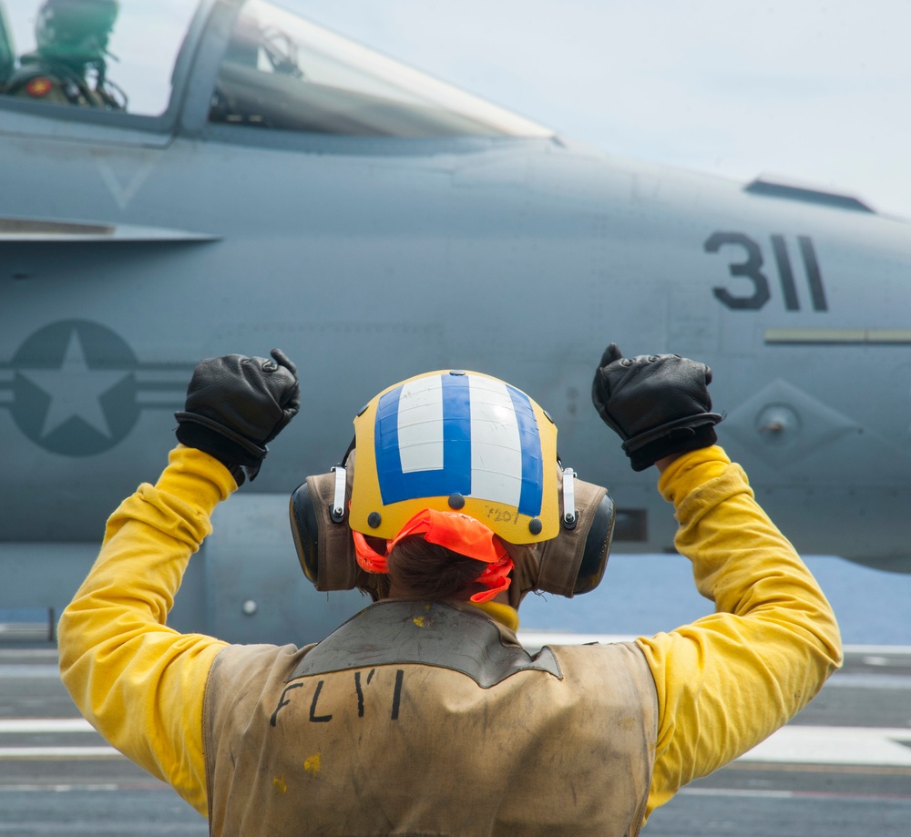 The aircraft carrier USS George H.W. Bush (CVN 77). GHWB is underway conducting routine training and qualifications for a 2017 deployment.