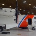 A Coast Guard Air Station Miami HC-144 Ocean Sentry airplane crew prepares the plane for the first post-storm damage assessment flight over Haiti following Hurricane Matthew on October 5, 2016.