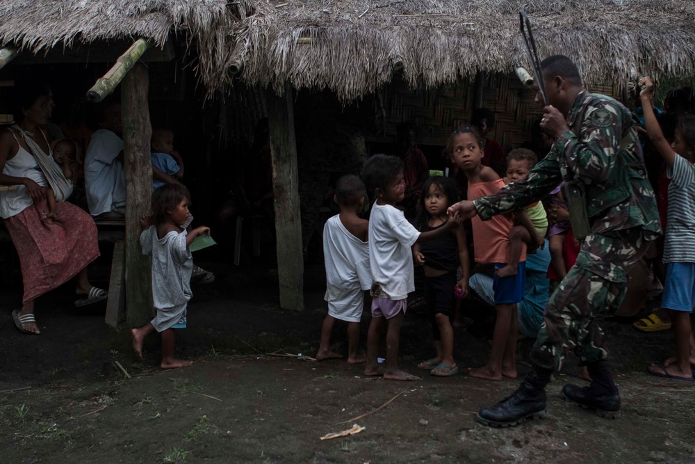 31st MEU Marines visit locals, spread safety practices