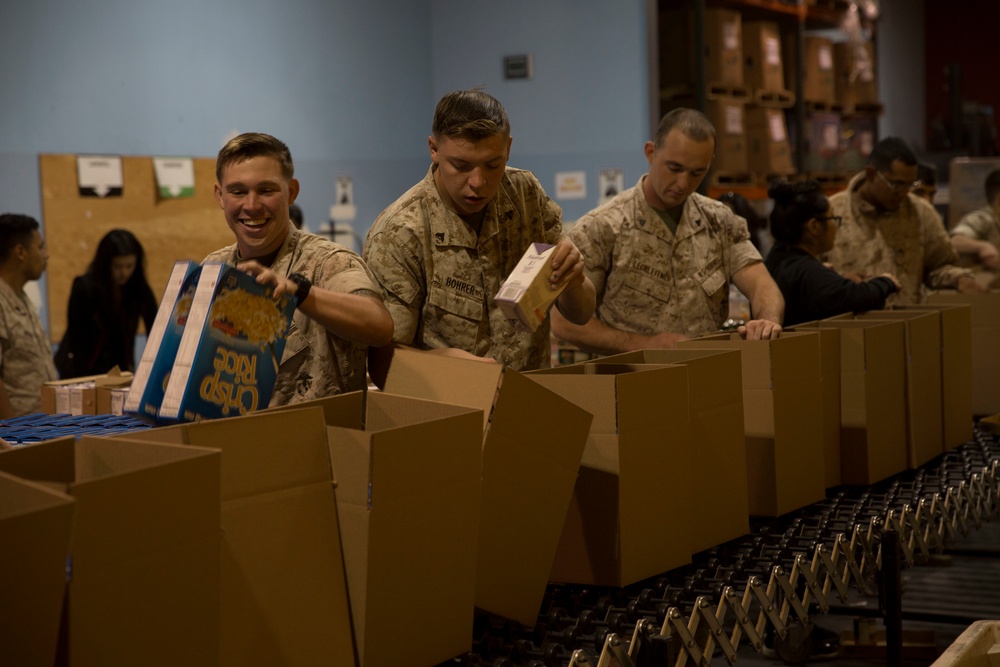 Marines volunteer at food bank