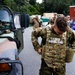 Soldier Dons Military Gear For Disaster Relief Efforts