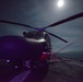 Moon light shines on a Coast Guard Air Station Borinquen MH-65 Dolphin helicopter aboard the Coast Guard Cutter Spencer.