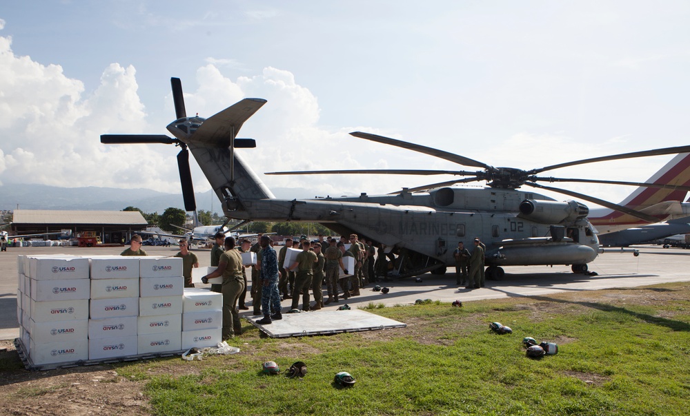 U.S. Marines deliver food supplies to areas affected by Hurricane Matthew