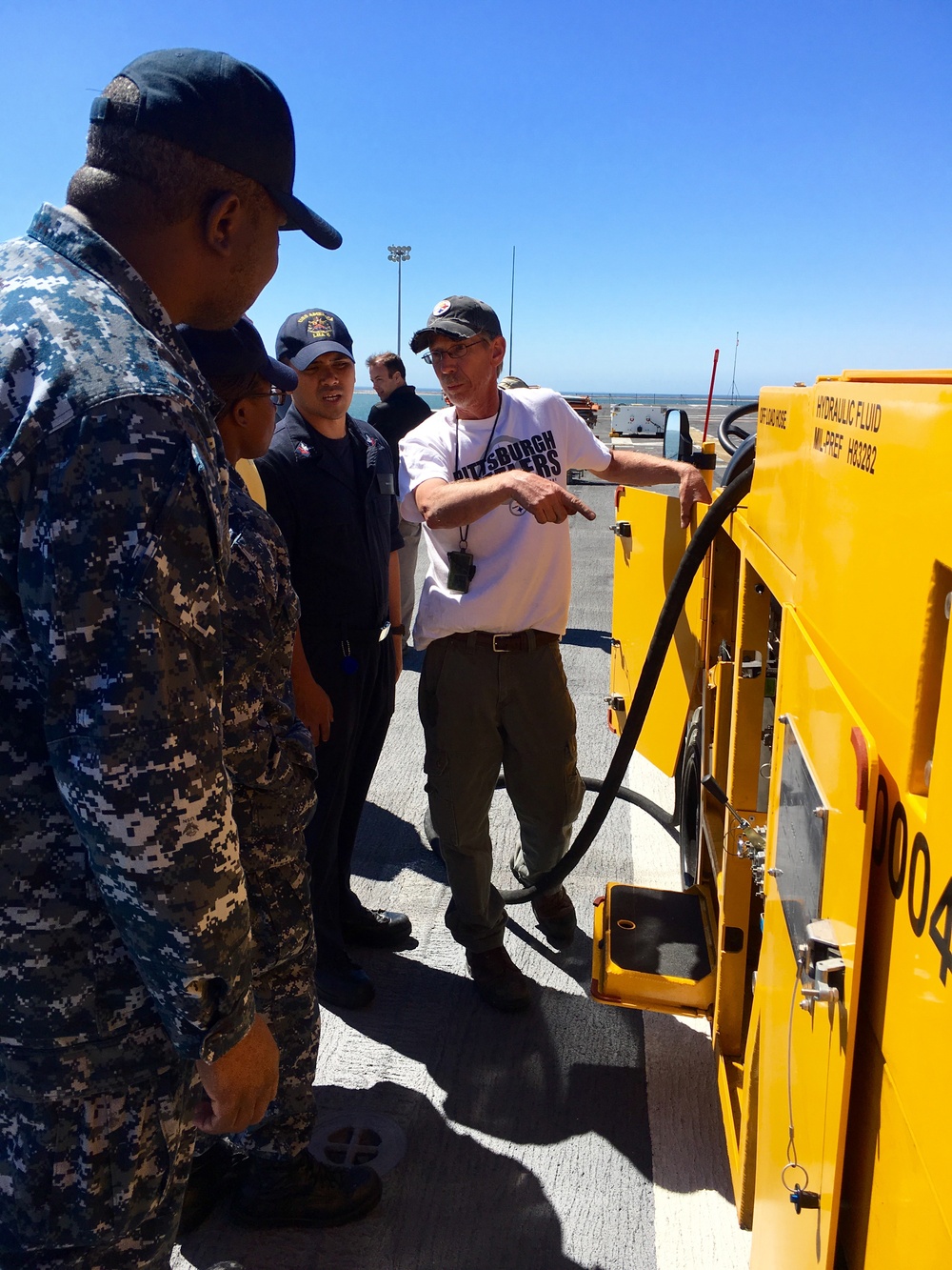 Sailors train on innovative Carderock-developed flight deck cleaning system aboard USS America