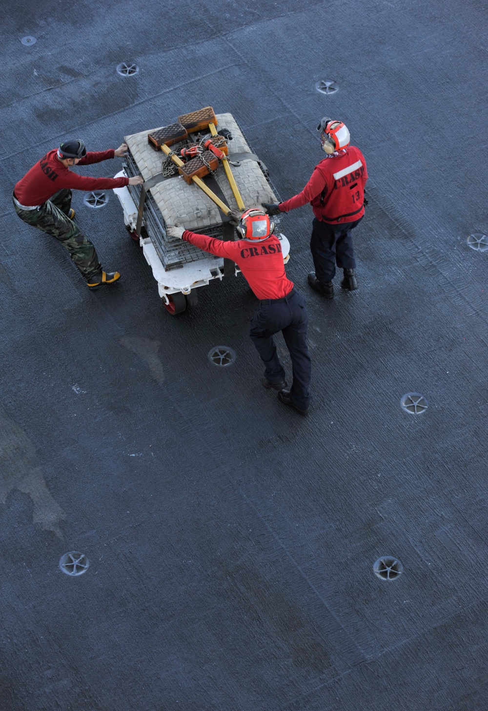 Nimitz Sailors test work on the flight deck