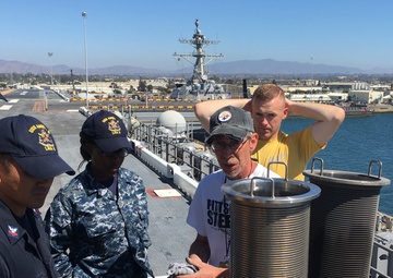 Sailors train on innovative Carderock-developed flight deck cleaning system aboard USS America