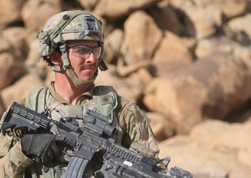 Soldiers navigate terrain at NTC