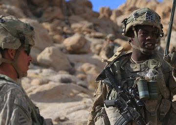 Soldiers navigate terrain at NTC