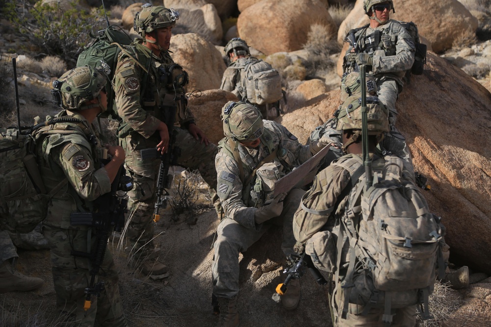 Soldiers navigate terrain at NTC