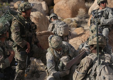 Soldiers navigate terrain at NTC