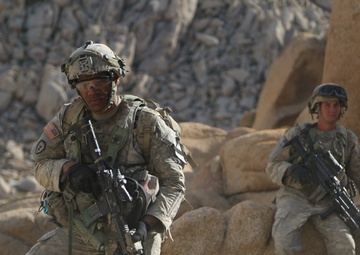 Soldiers navigate terrain at NTC
