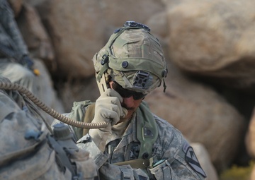 Soldiers navigate terrain at NTC