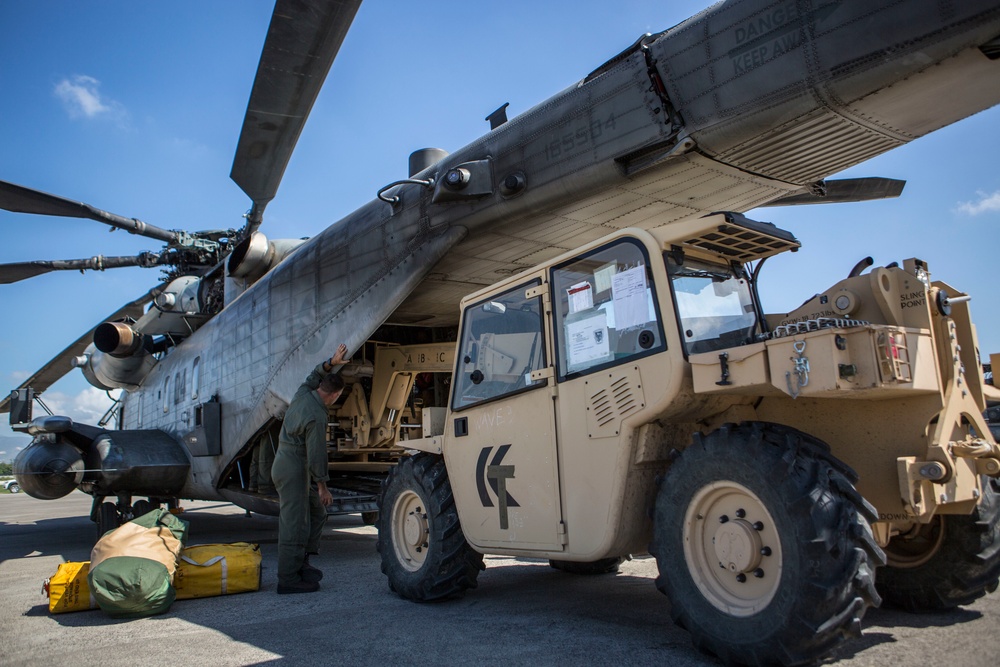 Marines with Joint Task Force Matthew prepare CH-53E Super Stallion to deliver relief support to Haiti