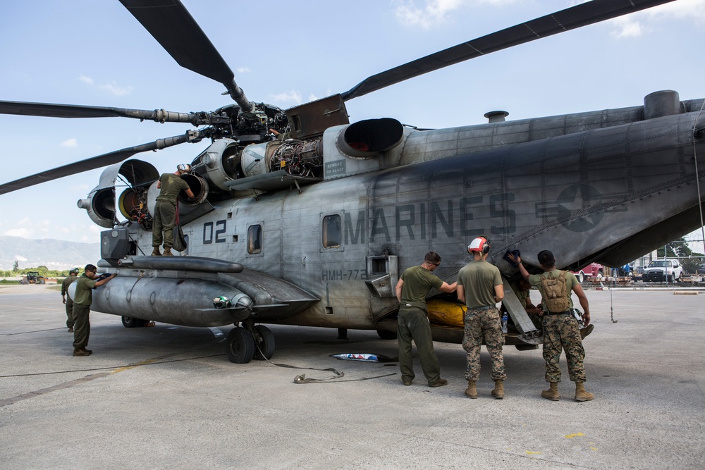 Marines with Joint Task Force Matthew prepare CH-53E Super Stallion to deliver relief support to Haiti