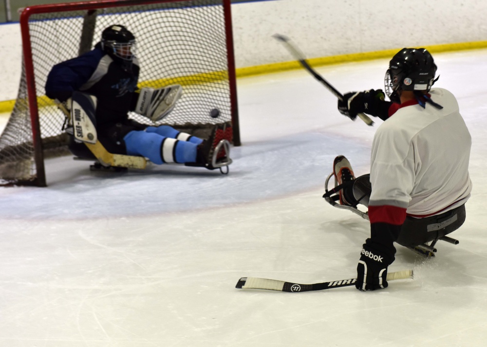 Soldiers continue to heal with sled hockey