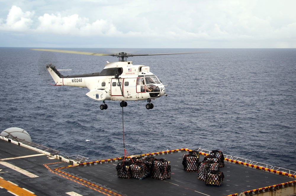 USS Bonhomme Richard (LHD 6) conducts replenishment at sea