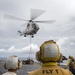 USS Bonhomme Richard (LHD 6) conducts replenishment at sea