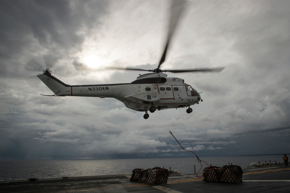 USS Bonhomme Richard (LHD 6) conducts replenishment at sea