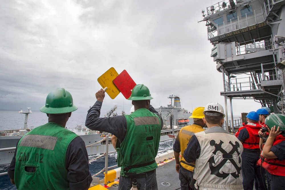 USS Bonhomme Richard (LHD 6) conducts replenishment at sea