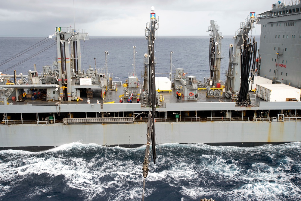 USS Bonhomme Richard (LHD 6) conducts replenishment at sea