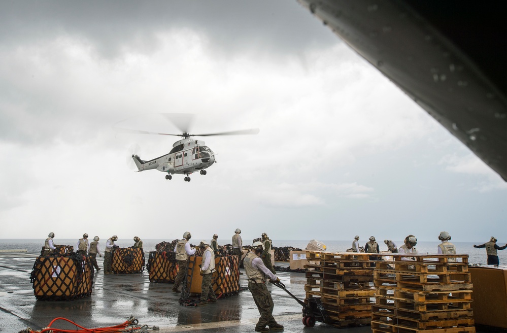 USS Bonhomme Richard (LHD 6) conducts replenishment at sea