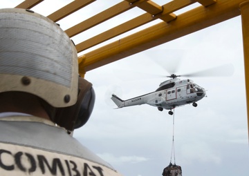 USS Bonhomme Richard (LHD 6) conducts replenishment at sea