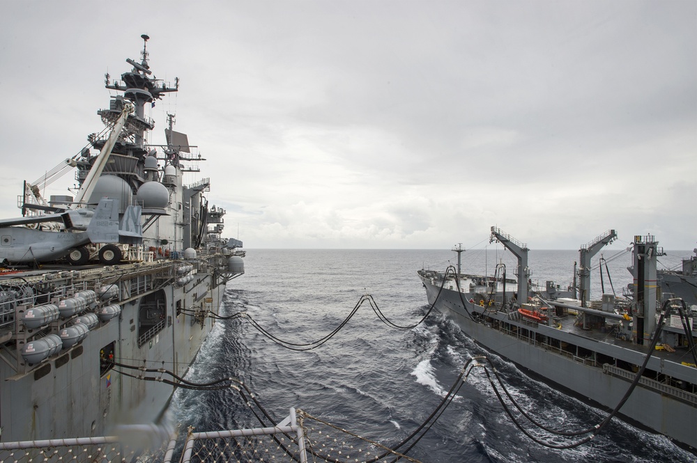 USS Bonhomme Richard (LHD 6) conducts replenishment at sea