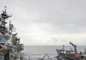 USS Bonhomme Richard (LHD 6) conducts replenishment at sea