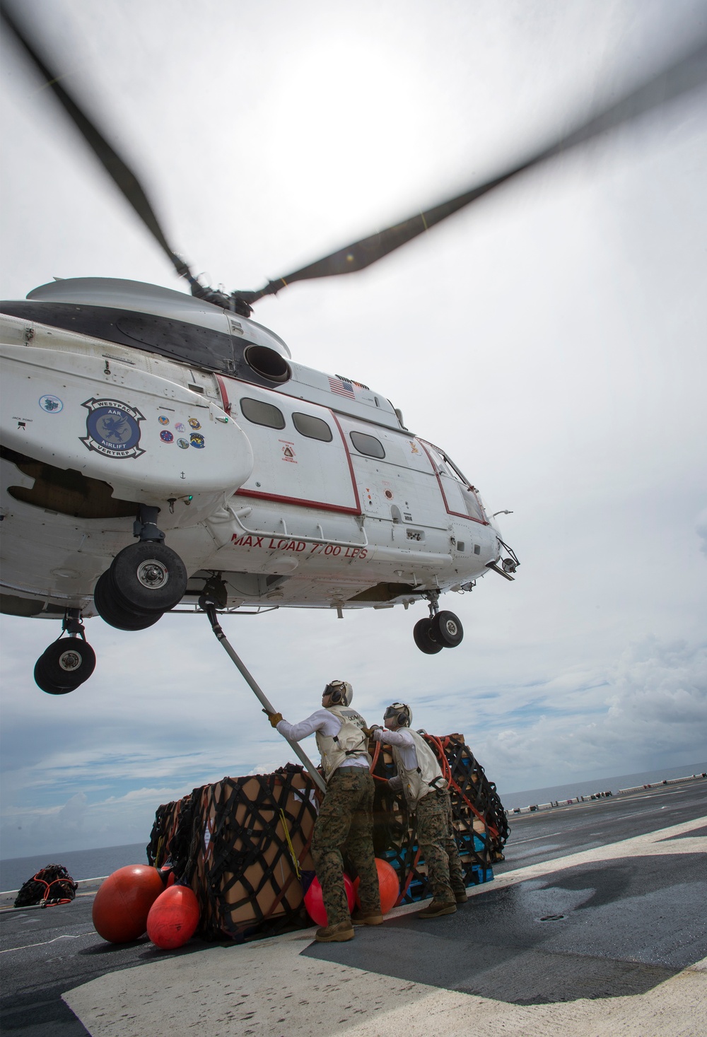 USS Bonhomme Richard (LHD 6) conducts replenishment at sea