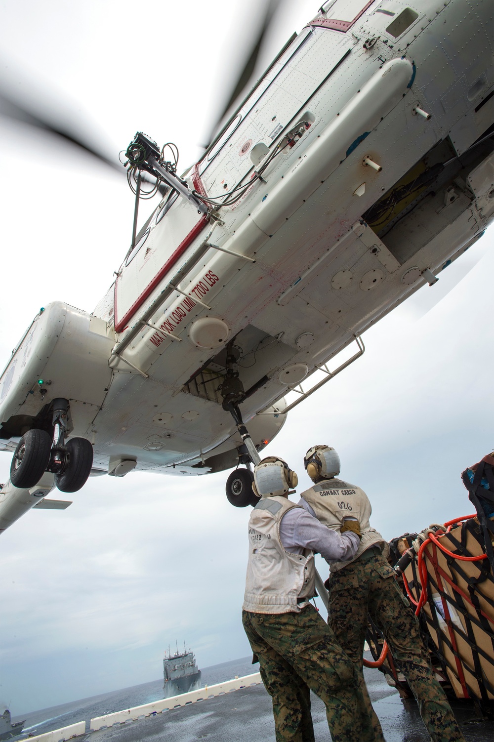 USS Bonhomme Richard (LHD 6) conducts replenishment at sea