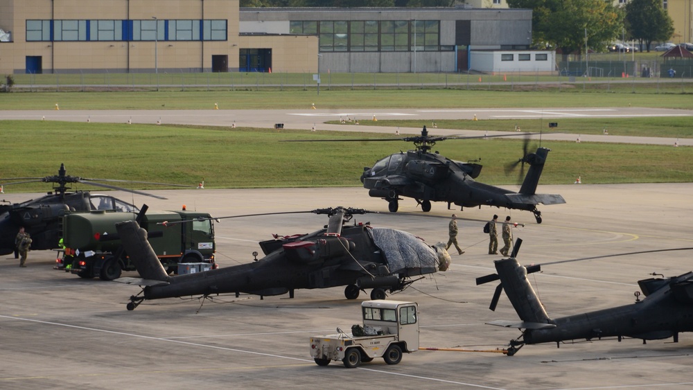 A U.S. Army company of Apache helicopters from 1st Battalion, 3rd Aviation Regiment (Attack Reconnaissance) return from Exercise Allied Spirit V