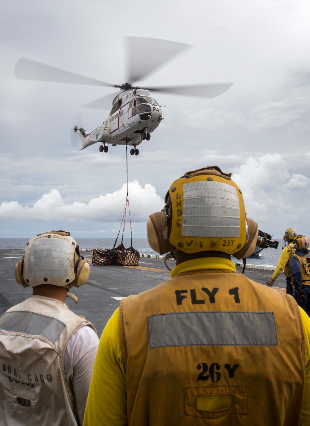 USS Bonhomme Richard (LHD 6) conducts replenishment at sea