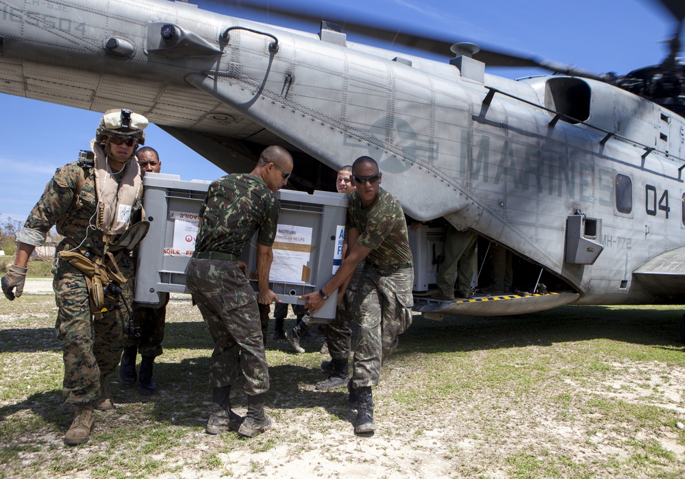 Marines with JTF Matthew deliver goods to Hurricane Matthew victims