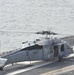 MH-60S takes off the Nimitz