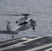 Sailor Directs a MH-60S Seahawk During Landing