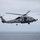 An MH-60R Sea Hawk Flies Above the Horizon