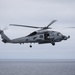 An MH-60R Sea Hawk Flies Above the Horizon