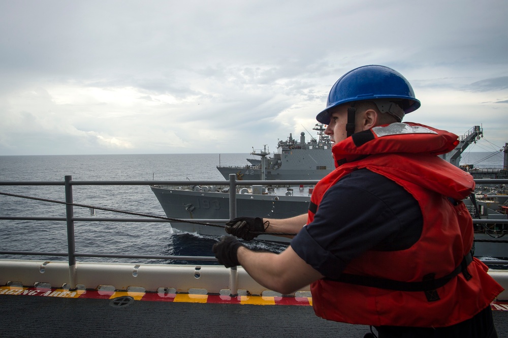 USS Bonhomme Richard (LHD 6) conducts replenishment at sea