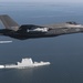 Navy's Next Gen F-35 Stealth Strike Fighter Flies Over Next Gen Stealth Guided-Missile Destroyer, USS Zumwalt (DDG 1000)