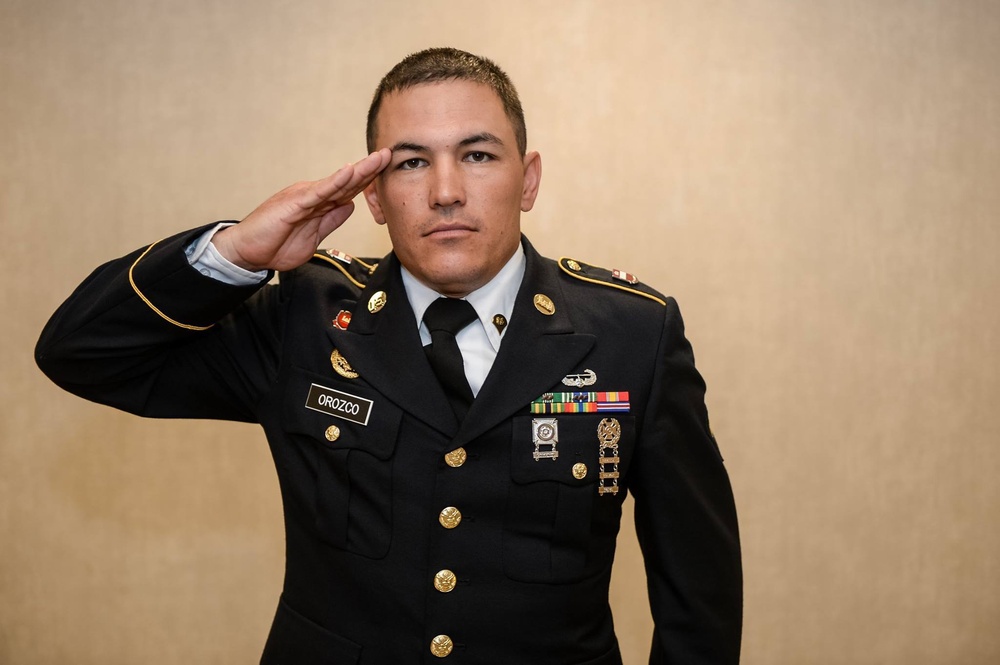 Spc. Michael S. Orozco renders a salute during the 2016 Best Warrior Competition Board