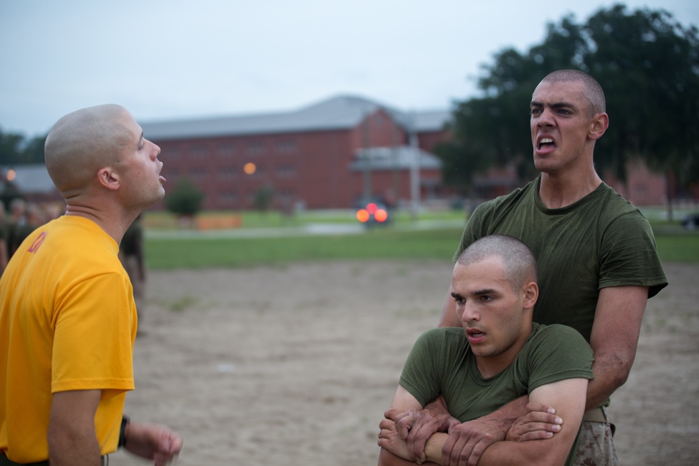 Marine recruits build strength during physical training on Parris Island