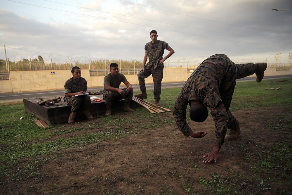 Hooking and jabbing, slashing and stabbing: Marines in Italy earn their brown belt